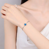 Blue Silver Heart Bracelet on modeling