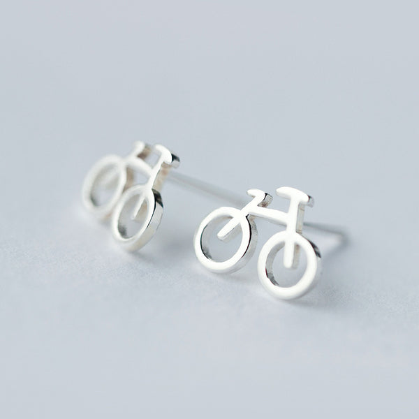 Girls' silver stud earrings front