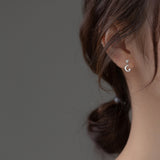 Silver Star Earrings, model wearing moon crescent, tiny cz diamond earrings 